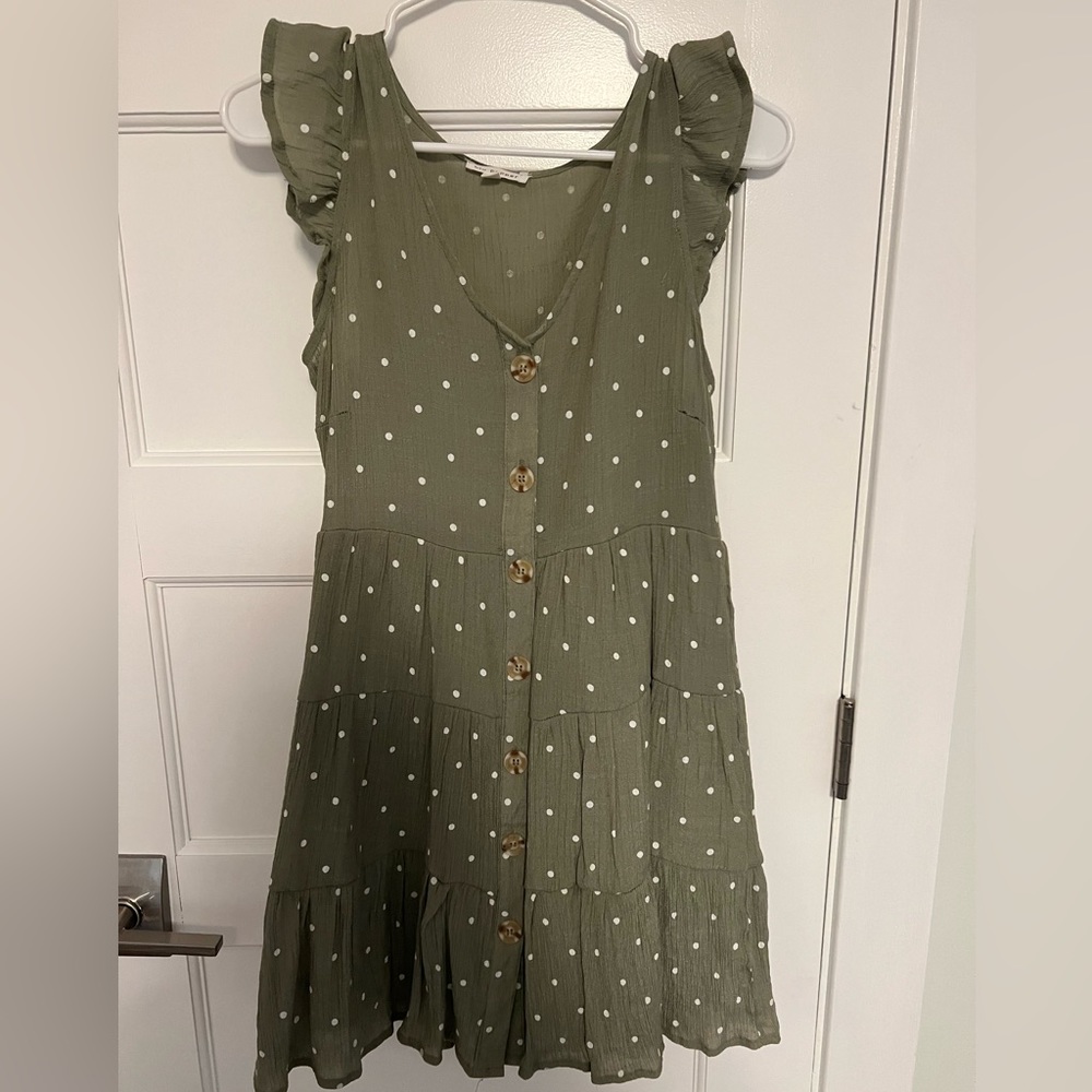 Green and white polkadot dress